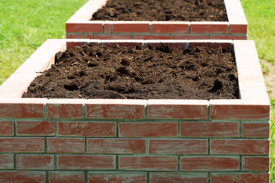 raised vegetable beds made with bricks