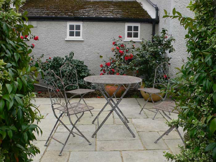 small courtyard patio with seating area