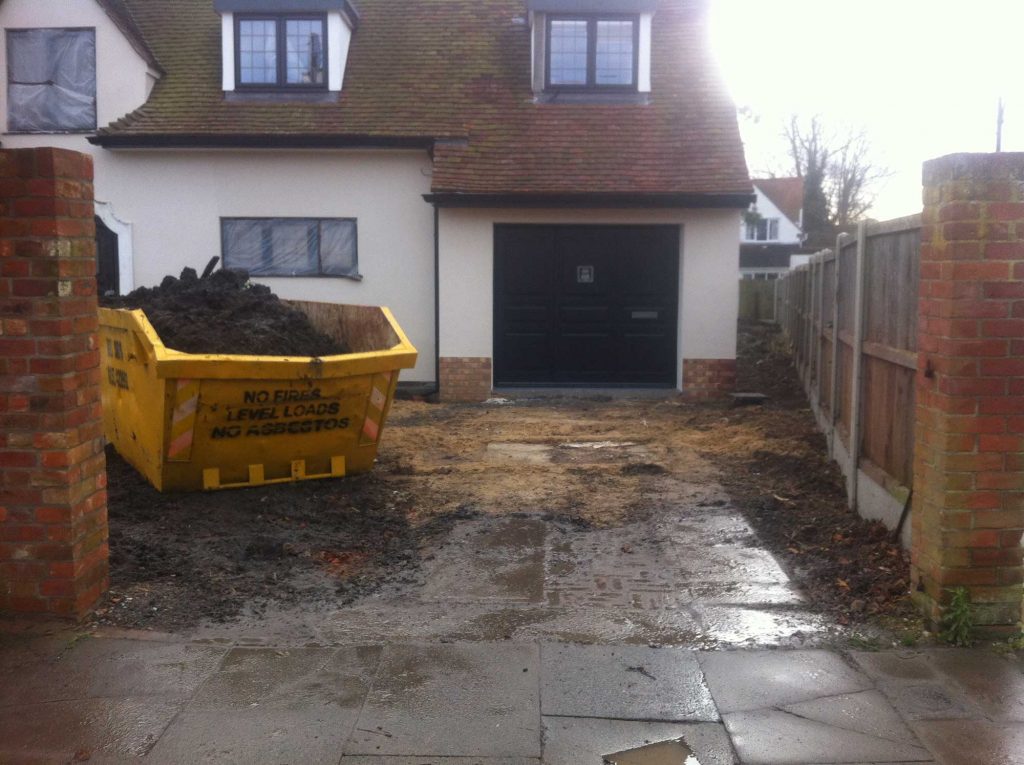 front garden and driveway being cleared for relandscaping