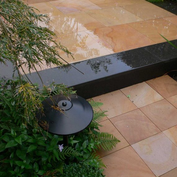 patio with contrasting paver design