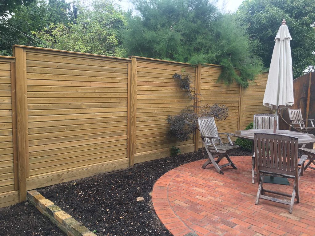 new fence and circular seating area
