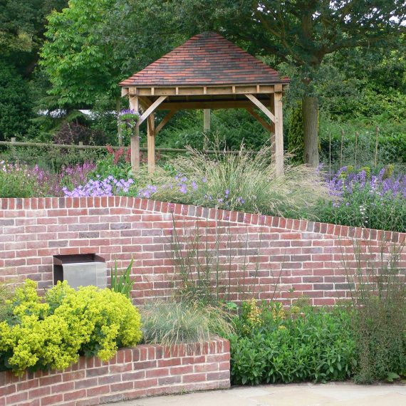 timber built pergola with tiled roof
