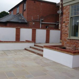 raised beds with patio and steps