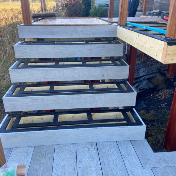 composite decking steps under construction and awaiting treads