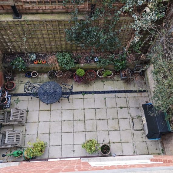 aerial view of a tiny garden before it underwent a makeover