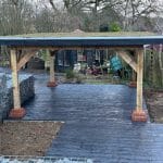 flat roof garden pergola with newly installed sedum roof